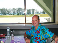 Mike in Phuket airport with sea in background