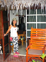 Patti standing at the back of our cottage
