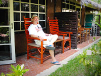 Mike relaxing on the back porch of cottage